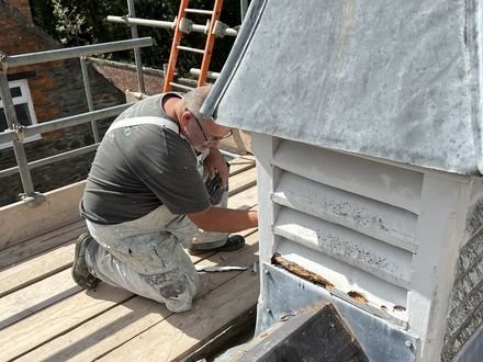Rebuilding the lantern on the roof, new lead work going on