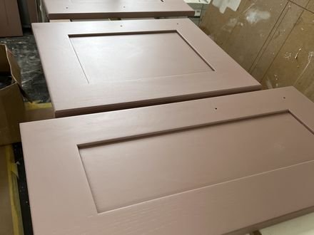 Kitchen doors laid out and spray-finished off site
