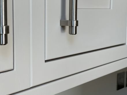 Close detail of the sprayed finish on a cabinet door